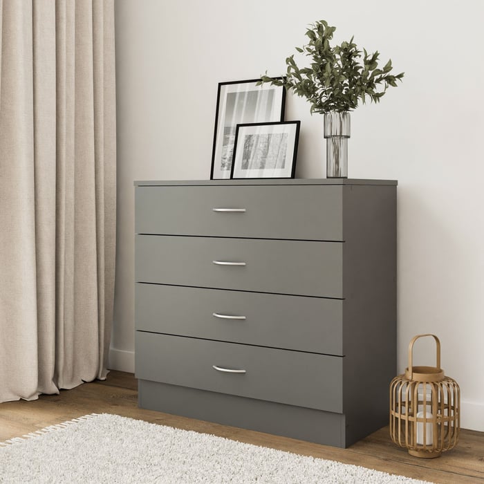 The chest of drawers ESSENTIAL grey in a modern living room.