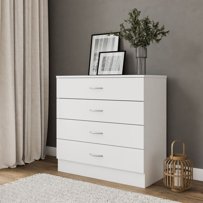 The chest of drawers ESSENTIAL white in a modern living room.