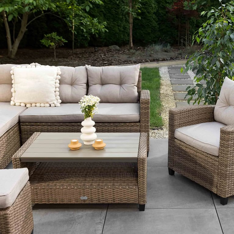 The garden furniture set DALMIA in beige in a cosy terrace.