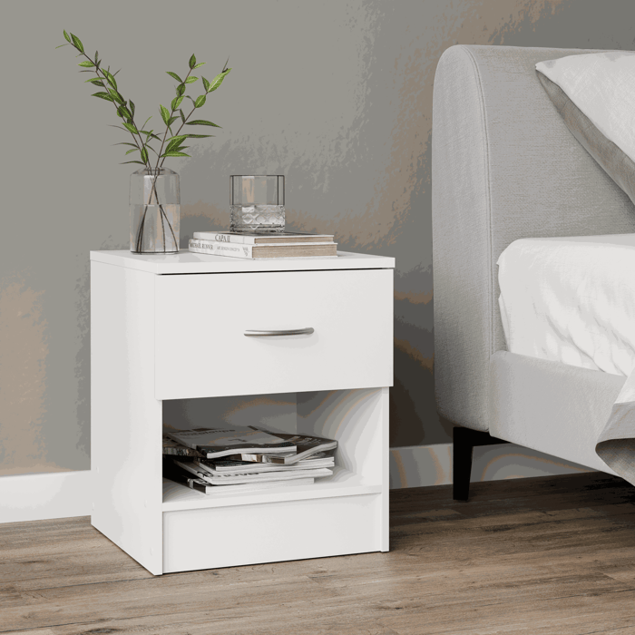 The bedside table ESSENTIAL white in a beautiful bedroom.