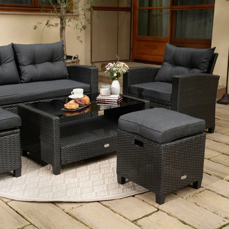 The garden furniture set DALMIA in black presenting a coffee table.