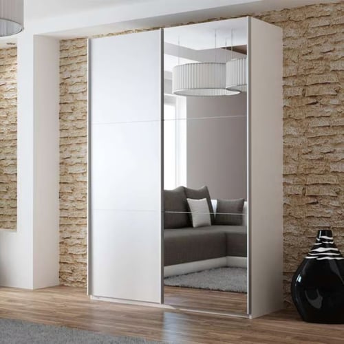 Modern Dako Furniture white sliding wardrobe with a mirrored door reflecting a cosy lounge corner, ideal for stylish small bedroom wardrobe ideas that enhance light and space.