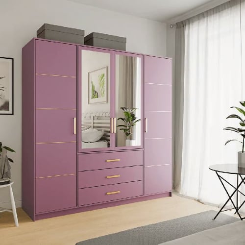 Purple painted wardrobe with mirror doors and gold handles in a modern bedroom