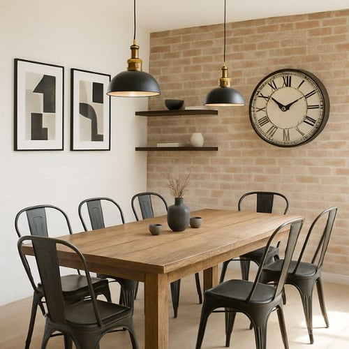 Rustic dining room with wood table, metal chairs, and industrial lighting against a brick accent wall