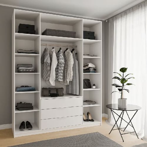 Wooden wardrobe with a mix of folded and hanging clothes, ideal for practical organising wardrobe solutions