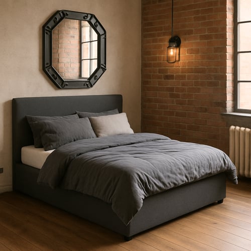 Dark grey ottoman bed with a sleek padded headboard in an industrial-style bedroom, demonstrating what is an ottoman bed when closed — a stylish and practical solution for hidden storage.