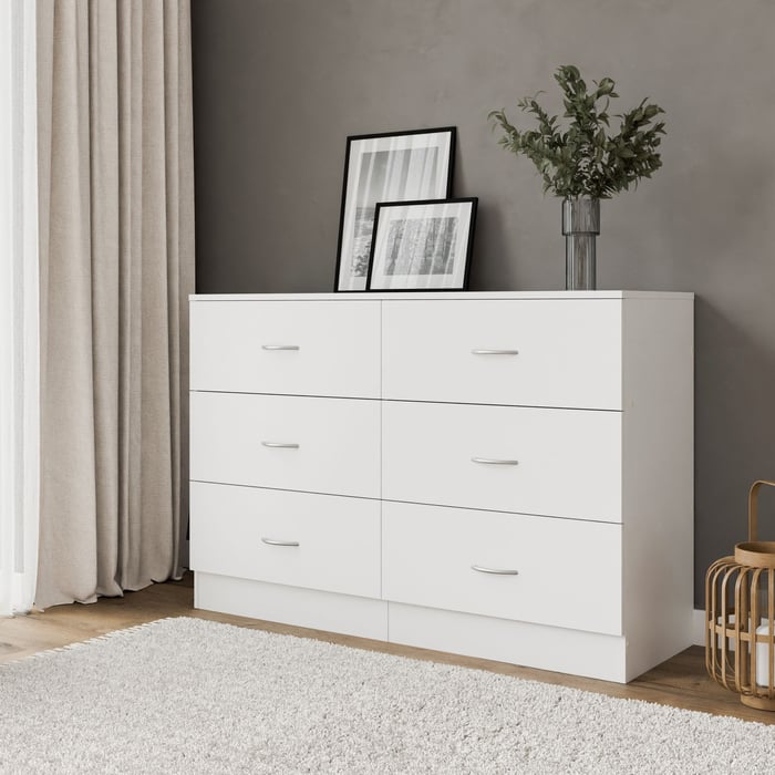 The ESSENTIAL chest of drawers in a cosy living room.