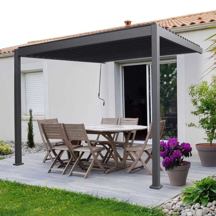 Titan Aluminium Wall Mounted Pergola - 3m Square - Grey attached to a house